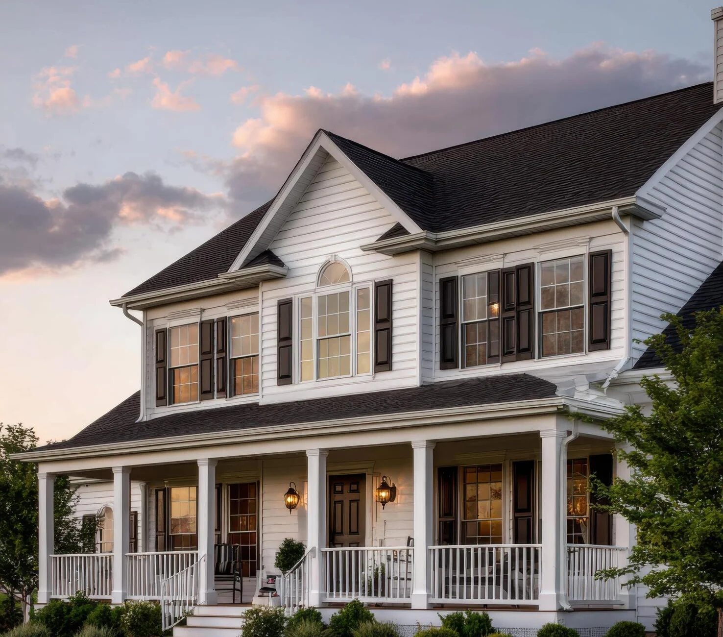 White porch home at sunset representing Helena, Alabama